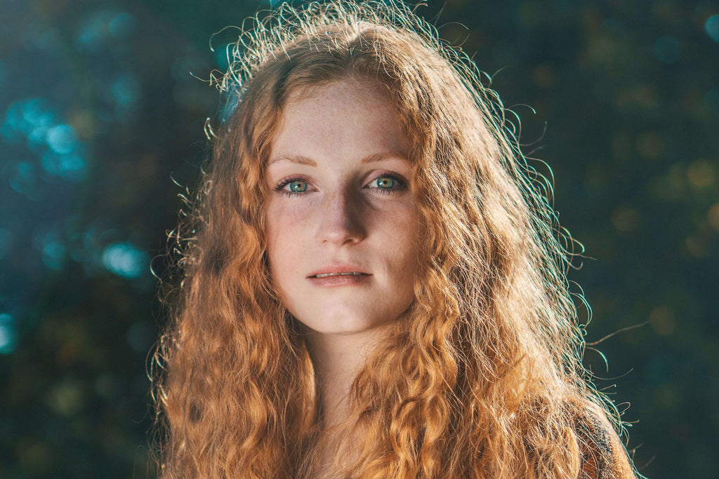 woman with curly strawberry blonde hair