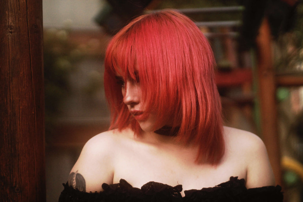 woman with red hair bob