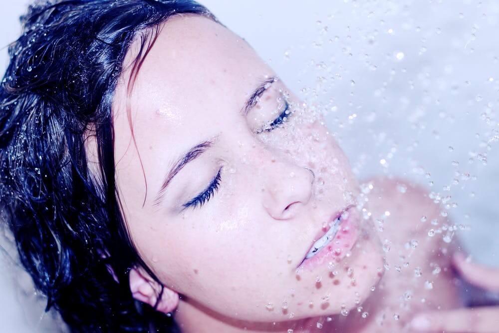 woman wet hair showering